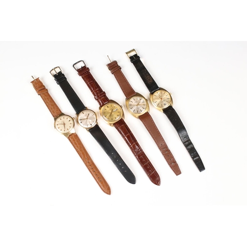 312 - A collection of five vintage gents wristwatches to include Avia, Montine, Garrard, Le Monde and Roam... 