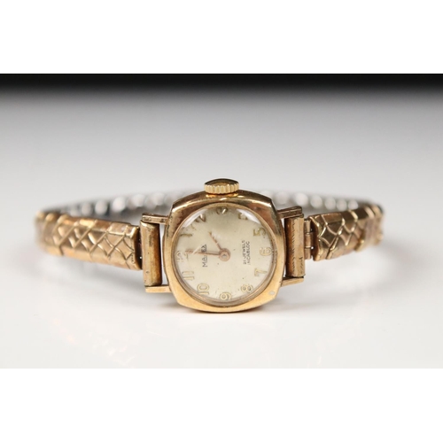 313 - A ladies Ingersol wristwatch set into a 9ct gold case with 9ct gold strap together with a similar 9c... 