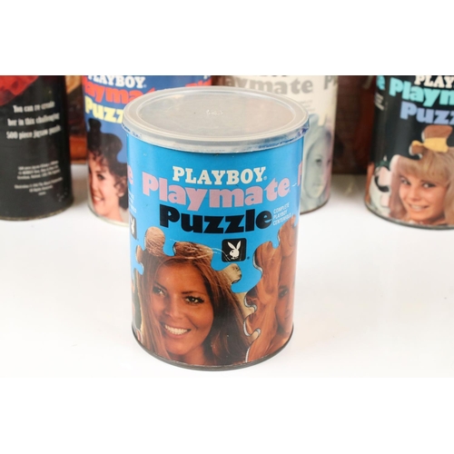 319 - A small collection of playboy jigsaw puzzles to include tin boxed examples.