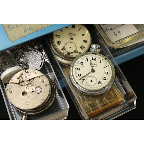 320 - A large collection of watches, watch parts, watch repair tools and related literature.