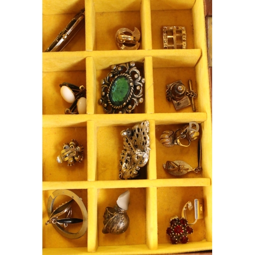 335 - A collection of mainly vintage costume jewellery to include earrings, necklaces, bracelets...etc.