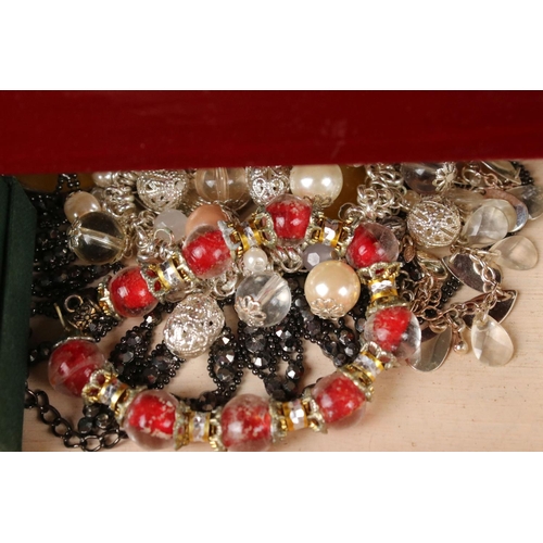 335 - A collection of mainly vintage costume jewellery to include earrings, necklaces, bracelets...etc.