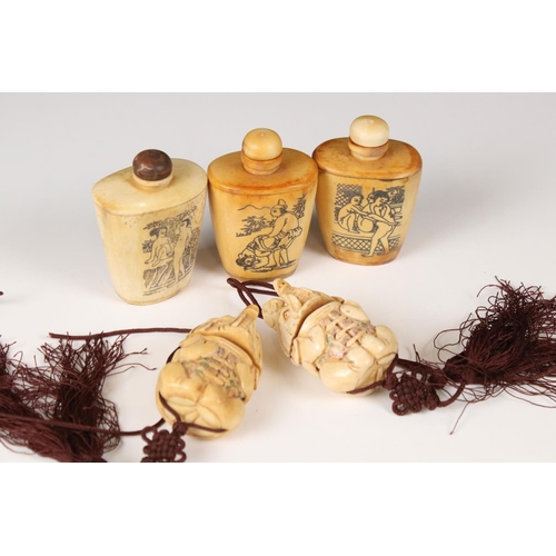 348 - Three Chinese bone snuff bottles with erotic scenes together with two bone inro.