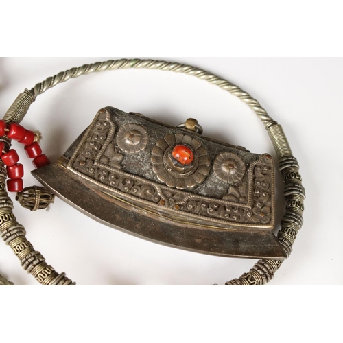 350 - A small collection of ethnic purses and bags together with a large white metal choker necklace.