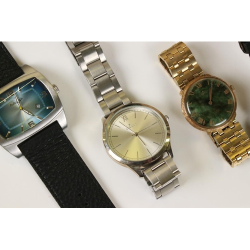 353 - A small collection of gents wristwatches together with spare straps and links contained within a jew... 