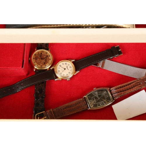 353 - A small collection of gents wristwatches together with spare straps and links contained within a jew... 