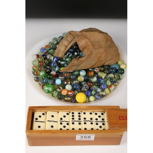 358 - A mixed collection of marbles together with a wooden cased domino set by Jaques of London