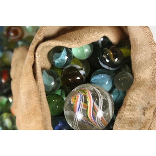 358 - A mixed collection of marbles together with a wooden cased domino set by Jaques of London