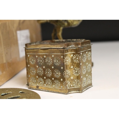 360 - A box of mixed metalware to include brass trinket boxes, candlesticks and animal figures...etc..