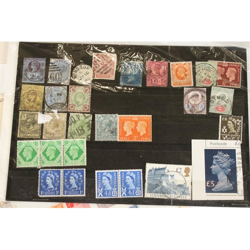 379 - A small collection of stamps to include Victorian and Edwardian examples.