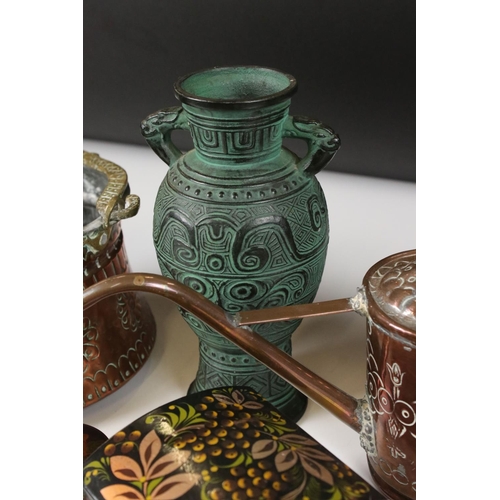 455 - An early 20th century copper watering can and planter together with two trinket boxes and an urn.