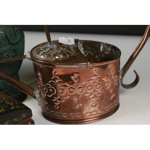 455 - An early 20th century copper watering can and planter together with two trinket boxes and an urn.