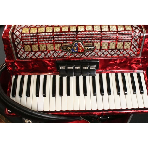 477 - Red ' Barcarole Prominenz ' Accordion, 51cm wide, with shoulder strap and fitted in an Accordion Cas... 