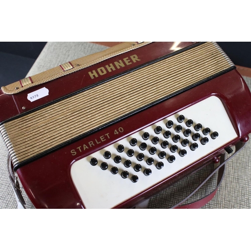 489 - Hohner ' Starlet 40 ' Red and Gold coloured Accordion, 31cm wide, in an un-related case