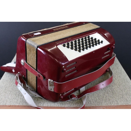 489 - Hohner ' Starlet 40 ' Red and Gold coloured Accordion, 31cm wide, in an un-related case