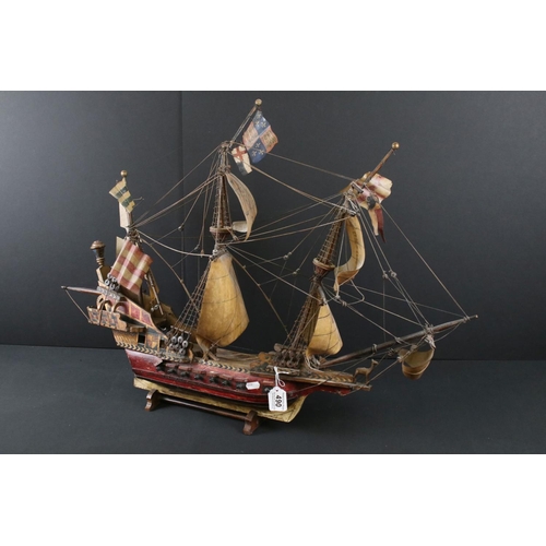 490 - Scratch-built Wooden Model of a Galleon with three masts, held on a wooden stand, 85cm long x 61cm h... 