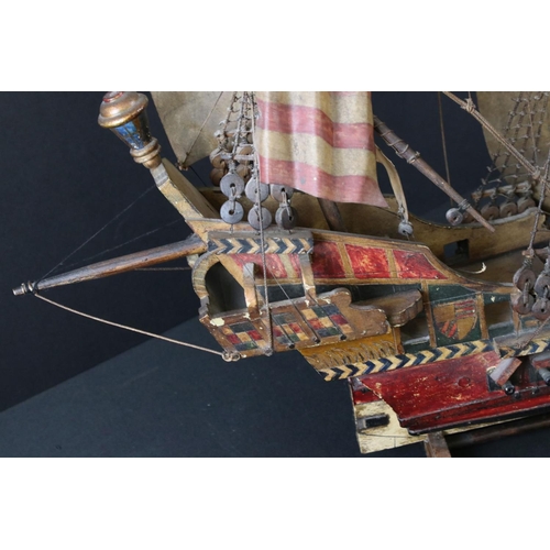 490 - Scratch-built Wooden Model of a Galleon with three masts, held on a wooden stand, 85cm long x 61cm h... 