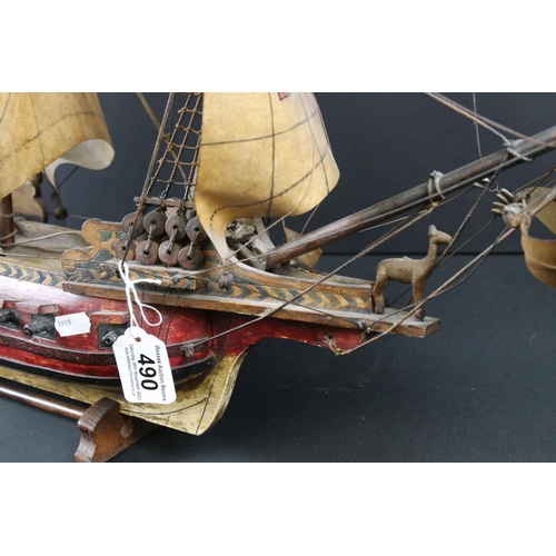 490 - Scratch-built Wooden Model of a Galleon with three masts, held on a wooden stand, 85cm long x 61cm h... 