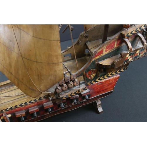 490 - Scratch-built Wooden Model of a Galleon with three masts, held on a wooden stand, 85cm long x 61cm h... 