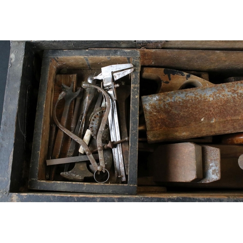 491 - Early 20th century Stained Pine Tool Box containing a quantity of old tools including wooden handled... 