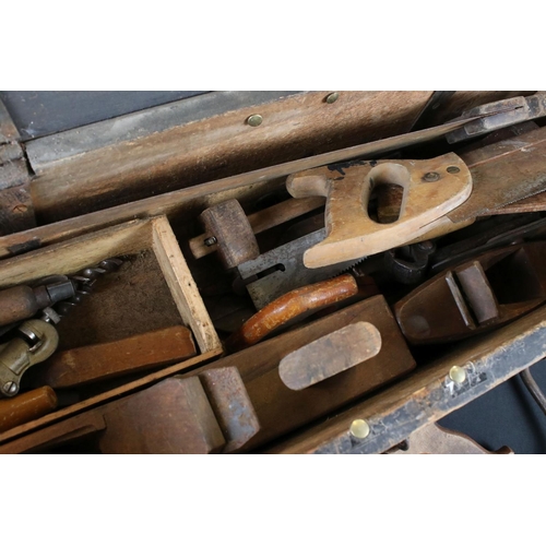 491 - Early 20th century Stained Pine Tool Box containing a quantity of old tools including wooden handled... 