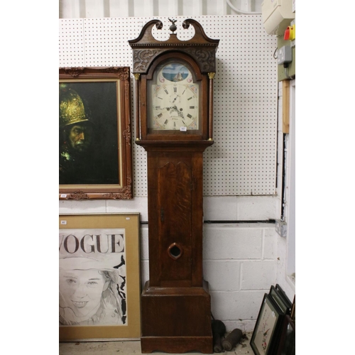 557 - 19th century 8 day Oak Longcase Clock, the arched white painted face with rocking boat, seconds dial... 