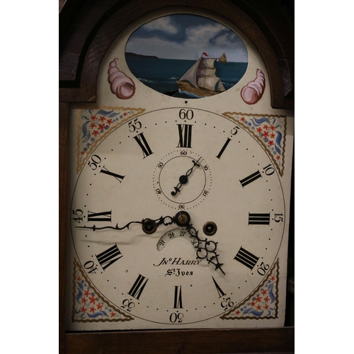 557 - 19th century 8 day Oak Longcase Clock, the arched white painted face with rocking boat, seconds dial... 