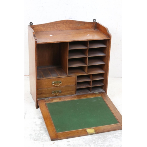 560 - Early 20th century Oak Writing / Stationery Cupboard, the fall front with green baise surface to ins... 