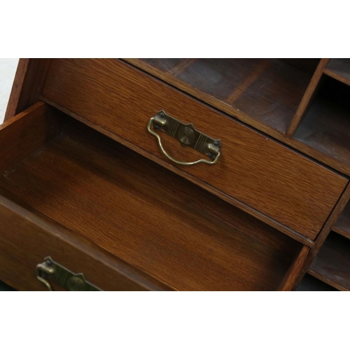 560 - Early 20th century Oak Writing / Stationery Cupboard, the fall front with green baise surface to ins... 