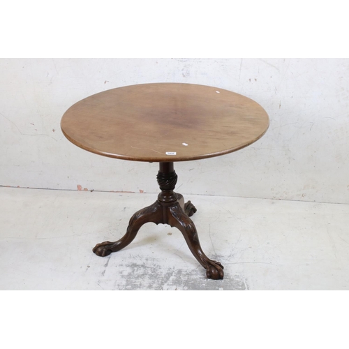 568 - Early George III Mahogany Circular Tilt Top Tripod Supper Table with carved ball and claw feet, 91cm... 