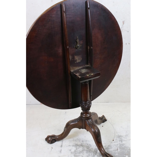 568 - Early George III Mahogany Circular Tilt Top Tripod Supper Table with carved ball and claw feet, 91cm... 