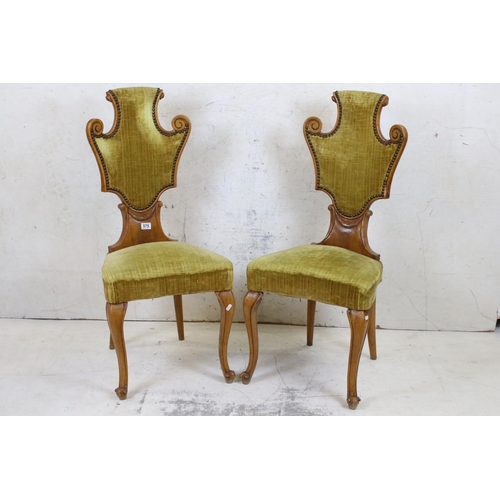 575 - Pair of Continental Side Chairs with upholstered scrolling shaped backs and over stuff upholstered s... 