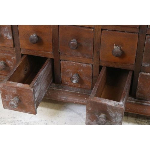 582 - Hardwood Table Top Multi-drawer Spice Cabinet of eighteen small drawers, 65cm wide x 35cm high