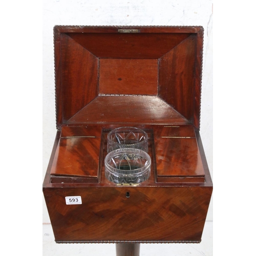 593 - William IV Mahogany Teapoy of sarcophagus form, the hinged lid enclosing fitted interior with mixing... 