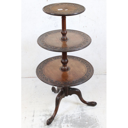 599 - Mahogany Circular Dumb Waiter in the 18th century manner, the three graduating revolving trays, rais... 