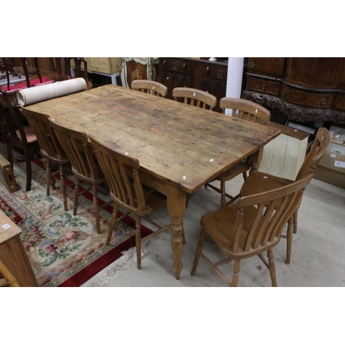 609 - Large Pine Kitchen Table raised on turned legs, 183cm long x 95cm wide x 77cm wide together with a s... 