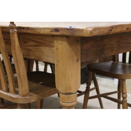 609 - Large Pine Kitchen Table raised on turned legs, 183cm long x 95cm wide x 77cm wide together with a s... 