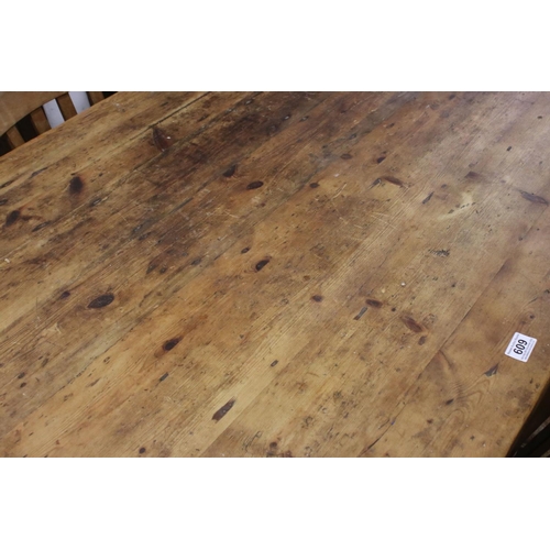 609 - Large Pine Kitchen Table raised on turned legs, 183cm long x 95cm wide x 77cm wide together with a s... 