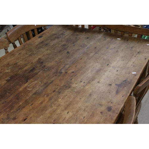 609 - Large Pine Kitchen Table raised on turned legs, 183cm long x 95cm wide x 77cm wide together with a s... 