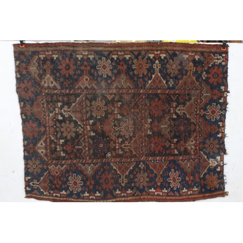 613 - Antique Eastern Wool Red and Blue Ground Rug, 130cm x 100cm