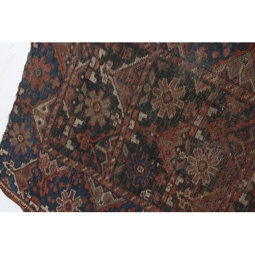 613 - Antique Eastern Wool Red and Blue Ground Rug, 130cm x 100cm