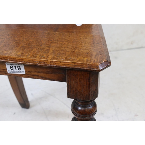 619 - Late 19th century Oak Hall Chair in the Aesthetic manner, with solid seat, the back inset with a Min... 