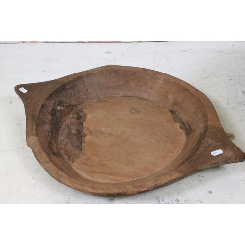 629 - Hand Turned Wooded Footed Bowl, 46cm diameter x 23cm high together with Wooden Dough Bowl, 60cm long