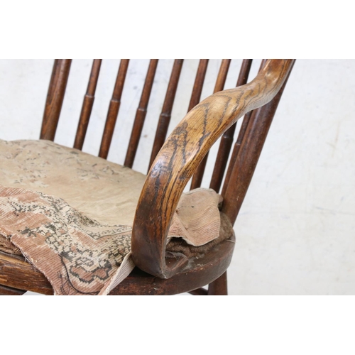 632 - Late 19th / Early 20th century Arts and Crafts Oak Chair with stickback and bentwood arms, 57cm wide... 