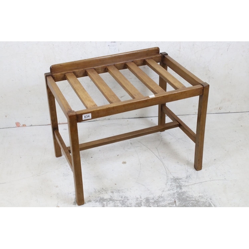 634 - Early 20th century walnut luggage rack, 68cm wide x 55cm high