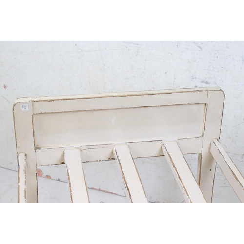 635 - Painted luggage stand, 57cm wide x 61cm high