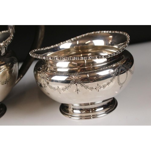 328 - A silver plated Harrods tea set to include tea pot, sugar bowl and cream jug together with an Asprey... 