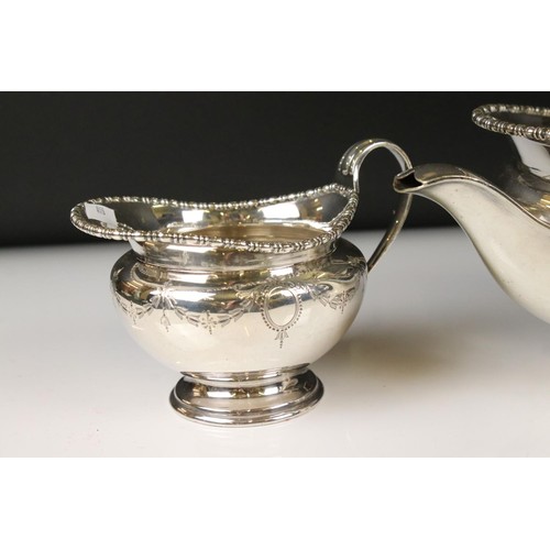 328 - A silver plated Harrods tea set to include tea pot, sugar bowl and cream jug together with an Asprey... 