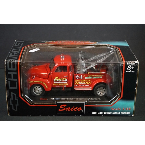 1120 - Boxed Revell Peterbilt Classic 359 1:24 diecast model truck no. 08892, together with a boxed Saico d... 