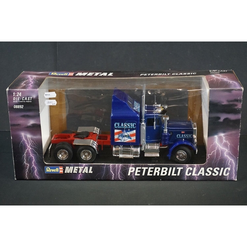 1120 - Boxed Revell Peterbilt Classic 359 1:24 diecast model truck no. 08892, together with a boxed Saico d... 